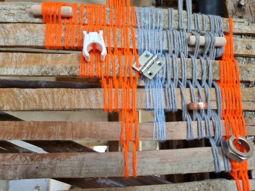 'Woven walls', 2022, wool, assorted ironmongery and diy materials